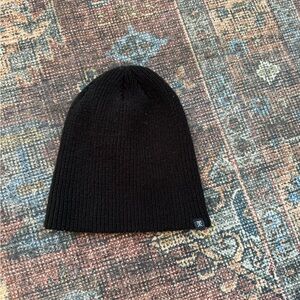 Rhône Beanie; black; worn